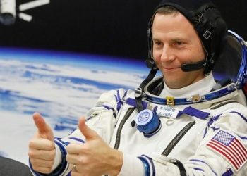 U.S. astronaut Nick Hague gestures prior to the launch of a Soyuz MS-12 space ship to the International Space Station Thursday. (Dmitri Lovetsky/AP) [Representational photo]