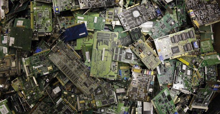 ** HOLD FOR STORY BY RICK CALLAHAN ** Circuit boards fill a bin at a recycling center in Indianapolis, Thursday, Aug. 27, 2009 at Workforce Inc., a nonprofit electronics recycler that contracts with the city of Indianapolis to recycle electronic waste the city collects at hazardous household waste drop-off sites. Frustrated by inaction in Congress, a growing number of states are trying to recycle some of the rising tide of junked TVs, computers and other electronics that have become one of the nation's fastest-growing waste streams. Nineteen states have passed laws setting goals for recycling old electronics, most of which now end up in landfills and contain toxic materials that can threaten groundwater. Thirteen other states are considering laws. (AP Photo/Michael Conroy)