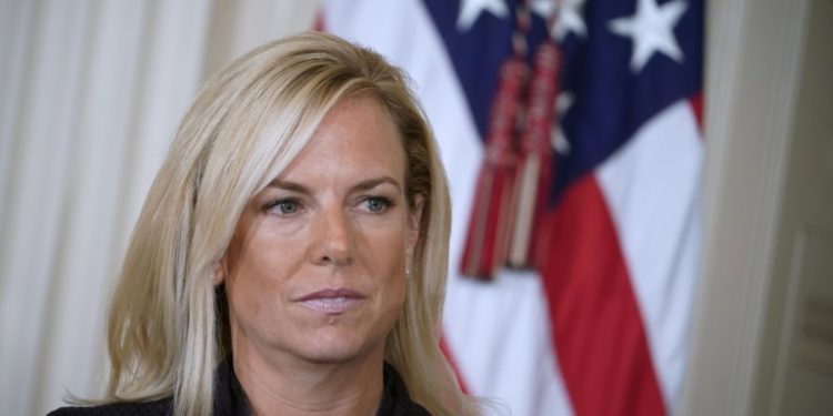 Kirstjen Nielsen, pictured in October 2017, listens as US President Donald Trump nominates her as US Secretary of Homeland Security (AFP)