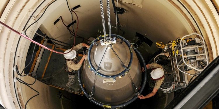 Airmen prepare a re-entry system for removal from a launch facility, Feb. 2, 2018, in the F. E. Warren Air Force Base missile complex. (Airman 1st Class Braydon Williams/Air Force via AFP)