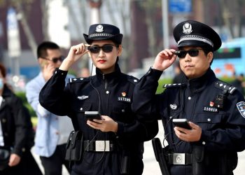 Police officers display their AI-powered smart glasses in Luoyang, Henan province. (Photo Reuters) {Representational]