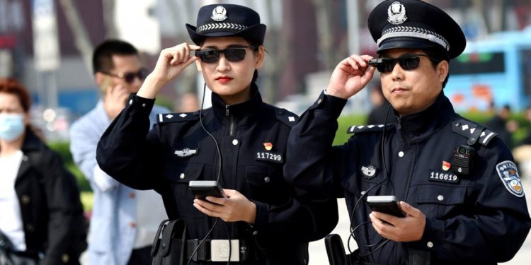 Police officers display their AI-powered smart glasses in Luoyang, Henan province. (Photo Reuters) {Representational]