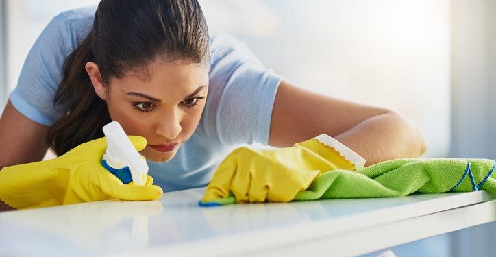 Shot of a woman doing her daily chores at home