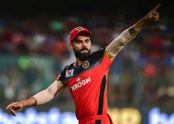 Bengaluru: RCB Skipper Virat Kohli gestures at his team members during the Indian Premier League 2019 (IPL T20) cricket match between Royal Challengers Bangalore (RCB) and Mumbai Indians (MI), at Chinnaswamy Stadium in Bengaluru, Thursday, March 28, 2019. (PTI Photo/Shailendra Bhojak) (PTI3_28_2019_000166B)