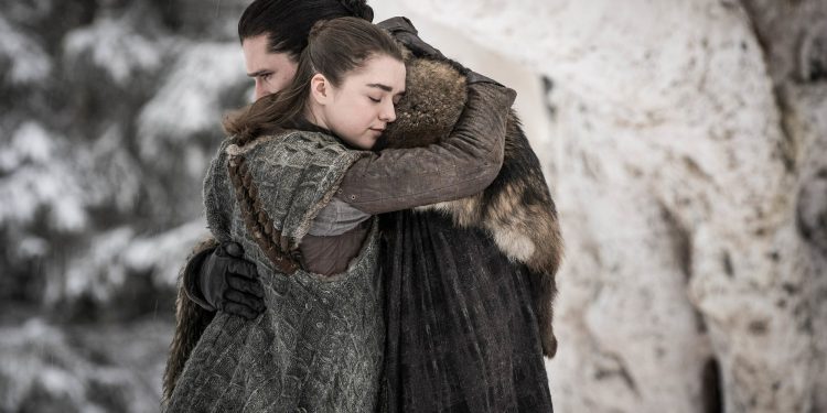 This image released by HBO shows Maisie Williams, left, and Kit Harington in a scene from "Game of Thrones," premiering on Sunday, April 14. The first episode of the final season of "Game of Thrones" is a record-breaker for the series and HBO. The pay channel said the 17.4 million viewers who watched Sunday’s episode either on TV or online represent a season-opening high for the fantasy saga. (Helen Sloan/HBO via AP)