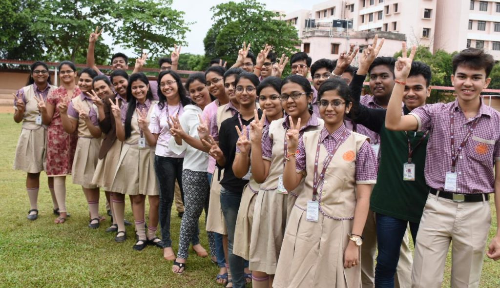 Happy BJEM students pose for a photograph.