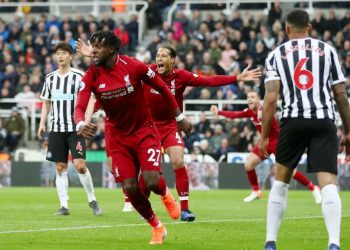 Divock Origi celebrates after scoring the match-winner for Liverpool against Newcastle United, Saturday