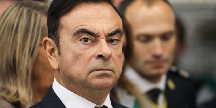 Chairman and CEO of Renault-Nissan-Mitsubishi Carlos Ghosn looks on during a visit of French President at the Renault factory, in Maubeuge, northern France, on November 8, 2018. - Macron is on a week-long tour to visit the most iconic French landmarks of the First World War, ahead of celebrations for the 100th anniversary of the November 11, 1918 armistice. (Photo by Ludovic MARIN / AFP)        (Photo credit should read LUDOVIC MARIN/AFP/Getty Images)