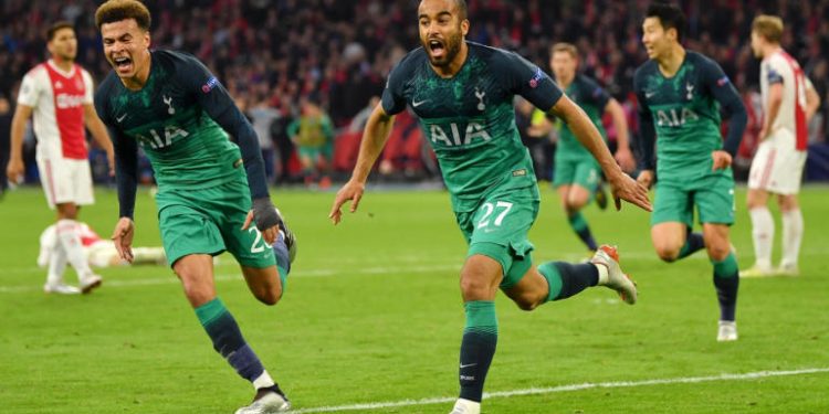 Lucas Moura (R) and Dele Alli of Tottenham Hotspur celebrate after the former’s third goal against Ajax Amsterdam, Wednesday in the Champions League semifinal