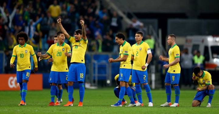 Brazilian players celebrate after winning the shootout against Paraguay