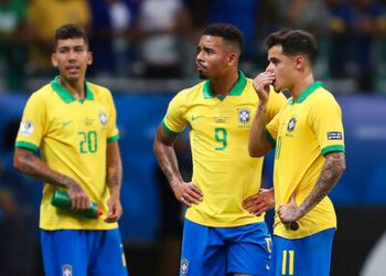 Brazil left the field to boos but remain top of Group A with four points from two games, and one game to play.