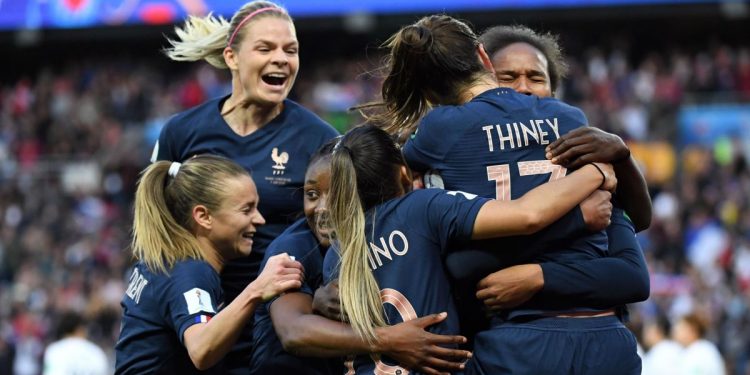 A sell-out crowd of 45,261 filled the Parc des Princes to watch the start of what is billed as the biggest women's World Cup yet, but there was no sign of the pressure getting to the French.