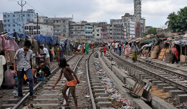 Homes beside the railroad tracks in Dhaka, Bangladesh