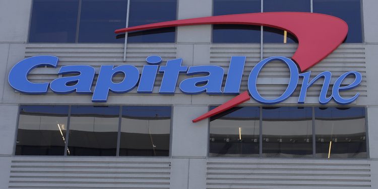 A Capital One sign is shown at a location in San Francisco, Tuesday, July 16, 2019. (AP Photo/Jeff Chiu)
