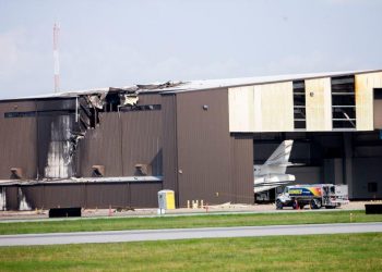 The Beechcraft BE-350 King Air hit an unoccupied hangar soon after 9 am, according to the Federal Aviation Administration.