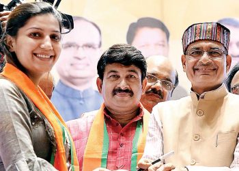 From left: Sapna Chaudhary, Manoj Tiwari and Shivraj Singh Chouhan during a function