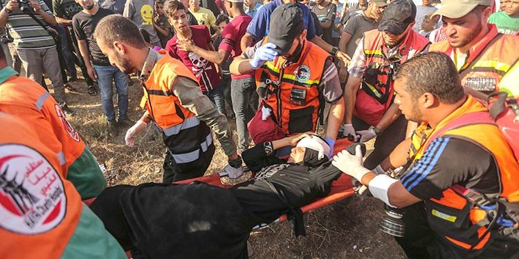 The ministry said another Palestinian was hospitalised in the shooting that came after the Israeli army said an attack helicopter and tank had fired at ‘armed suspects’ along the barrier that separates Israel from Gaza.