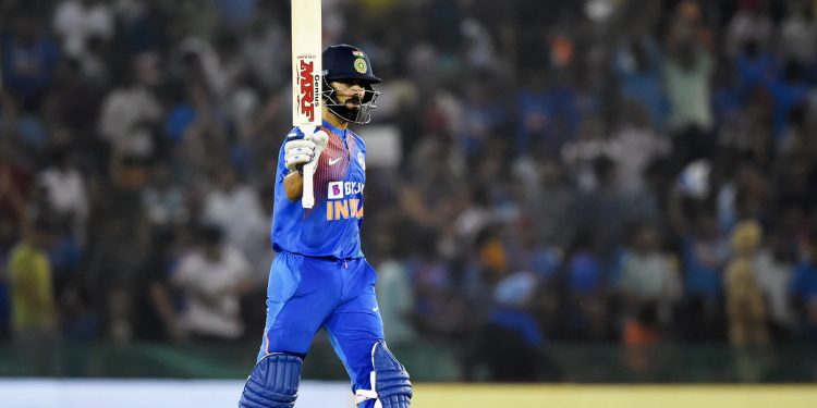 Virat Kohli acknowledges the applause of the crowd after reaching his 50, Wednesday