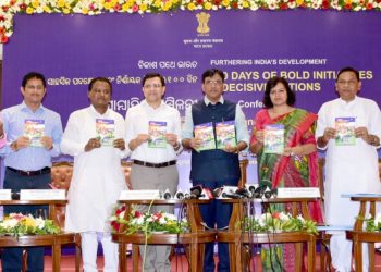 Dignitaries including Union Minister of State for Shipping, Chemicals and Fertilisers Mansukh Mandaviya (fourth from right) and Bhubaneswar MP Aparajita Sarangi releasing a book at Hotel Mayfair in City