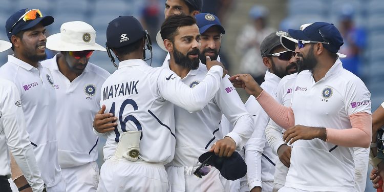 Pune: Indian cricket team players celebrate their victory during the day 4 of second India-South Africa cricket test match