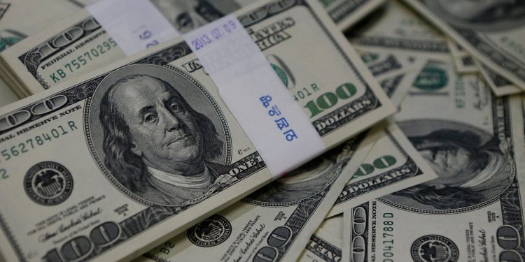 Dollar dips modestly amid jobs data