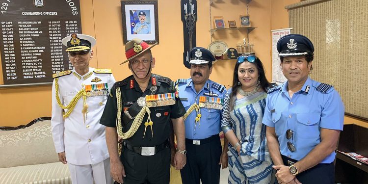 (L-R) Navy Chief Admiral Karambir Singh, Army Chief Gen Bipin Rawat, IAF Chief Air Chief Marshal Rakesh Kumar Singh Bhadauria, his wife Asha and cricket legend and honorary Group Captain Sachin Tendulkar