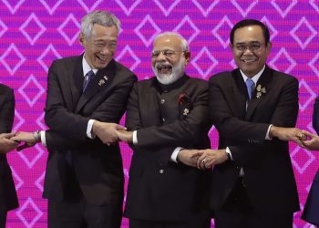 Prime Minister Narendra Modi shares a light moment with heads of state of other ASEAN countries