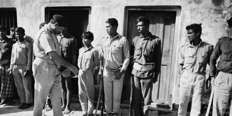 Pakistani General Amir Abdullah Khan Niazi, Governor of East Pakistan inspects a bunch of Razakar militia. (Image: Flickr)