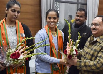 Saina Nehwal being welcomed to the BJP by party president JP Nadda