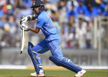 Shikhar Dhawan who top scored for India drives during the match against Australia