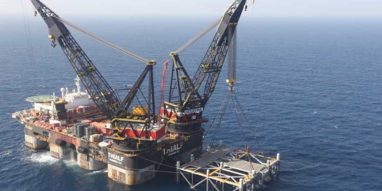 FILE - This Jan. 31, 2019 file photo, shows an oil platform in the Leviathan natural gas field, in the Mediterranean Sea off the Israeli coaast. Israel became a major energy exporter for the first time on Monday, Dec. 16, 2019, after signing a permit to export natural gas to neighboring Egypt. The announcement comes just days before a lucrative Israeli gas field in the Mediterranean Sea is expected to go online. (Marc Israel Sellem/Pool via AP, File)