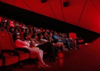 Cinema-goers wearing 3D glasses watch a movie at a PVR Multiplex in Mumbai November 10, 2013. REUTERS/Danish Siddiqui/Files