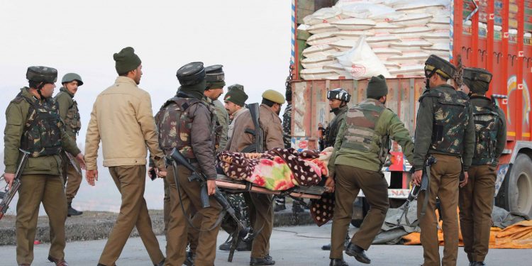 Body of one of the slain terrorists being carried away by the security personnel