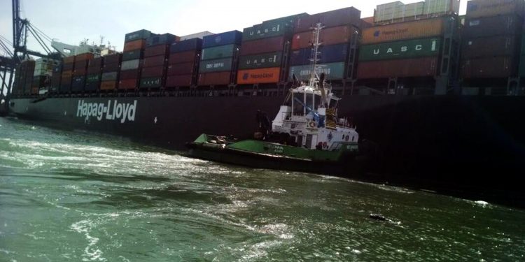 KARACHI, March 20, 2018 (Xinhua) -- Photo taken on March 20, 2018 shows the ship involved in a collision at the seaport of Karachi, southern Pakistan. A total of 19 containers drowned and went missing in Arabian Sea after two ships collided at the seaport in Pakistan's southern port city of Karachi, local media reported Tuesday. (Xinhua/IANS)