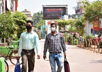 The Market Building in Capital city wears a deserted look amidst coronavirus scare even as two men are walking with masks, Monday