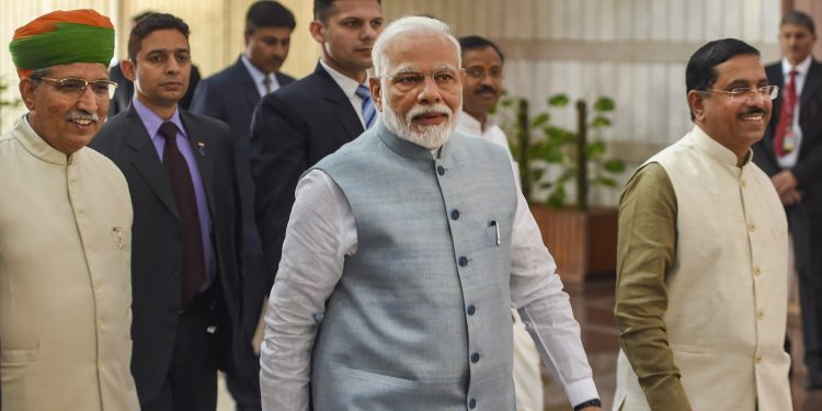 New Delhi: Prime Minister Narendra Modi,  Parliamentary Affairs Minister Pralhad Joshi and MoS Parliamentary Affairs Arjun Ram Meghwal arrive to attend the BJP Parliamentary Party Meeting at Parliament Library Building in New Delhi, Tuesday, March 3, 2020. (PTI Photo/Shahbaz Khan)