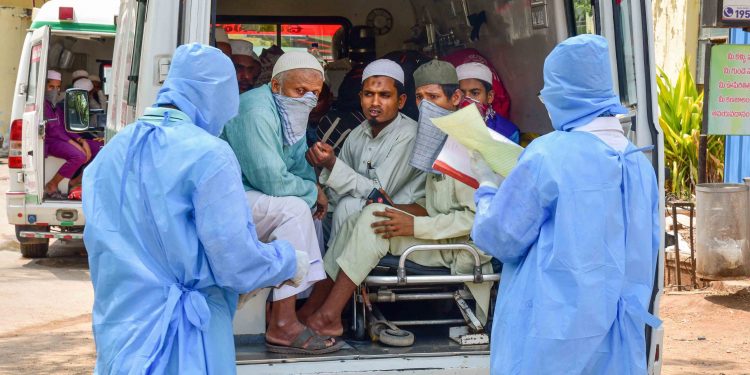 Suspected coronavirus patients being taken in an ambulance in Hyderabad to quarantine facilities