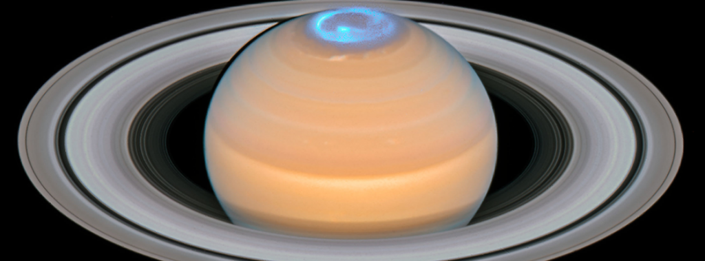 What makes Saturn's upper atmosphere so hot