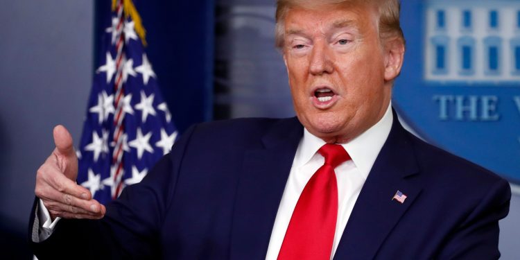 Mandatory Credit: Photo by Alex Brandon/AP/Shutterstock (10602083e)
President Donald Trump speaks about the coronavirus in the James Brady Press Briefing Room of the White House, in Washington
Virus Outbreak Trump, Washington, United States - 03 Apr 2020