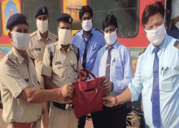 Train officials turn Good Samaritans, return cash and jewellery-laden bag to woman