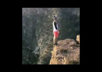 Stupidity! Man performs backflip on edge of cliff, video goes viral