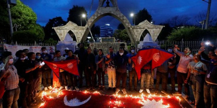 Nepalese people celebrate after the parliament approved a new map in Kathmandu, Nepal, (Image courtesy: Strait Times)