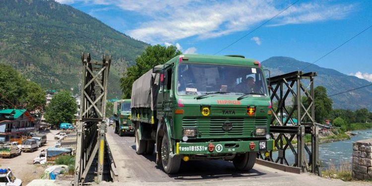 Indian army trucks depart towards Ladakh amid standoff between Indian and Chinese troops in eastern Ladakh, at Manali-Leh highway in Kullu district. (PTI Photo)