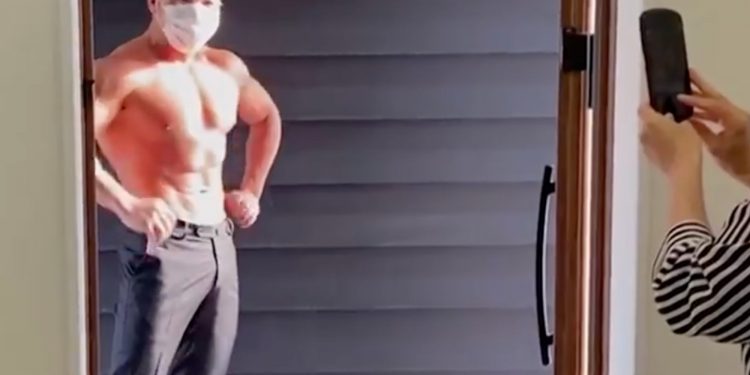 Bizarre idea! Shirtless bodybuilders used as food delivery boys in this restaurant