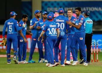 Delhi Capitals players congratulate each other after their victory over Rajasthan Royals in Dubai, Wednesday