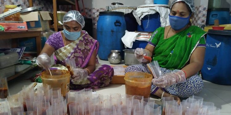 Manjula Patra (right) at her factory