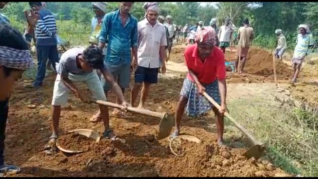 Villagers repair road on their own, draw praise