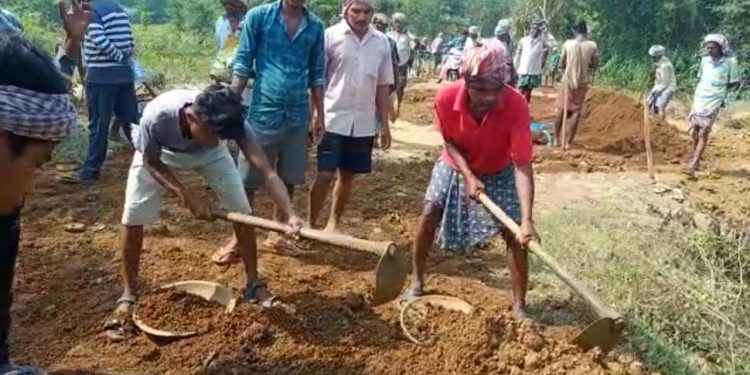 Villagers repair road on their own, draw praise