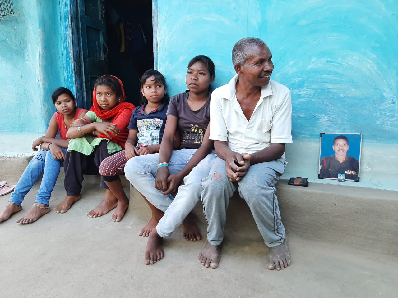 Retired jawan Chanduram Majhi with his daughters