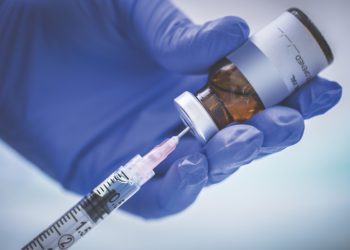 A stock photo of a Nurse preparing a vaccination